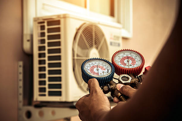 Professional Hvac technician working in Otisville, MI